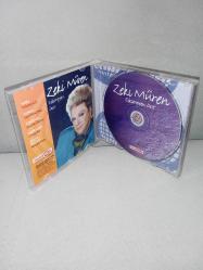 Cd Zeki Müren eskimeyen dost. Orijinal. Türküola. Dinlemeyi etkilemeyen çizikler var. Sorunsuz çalışıyor.