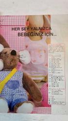 BURDA ELBİSE PATRONLU DERGİ - SAYI NO: 1 – BURDA ÇOCUK YAYINCI: DOĞAN BURDA DERGİ YAYINCILIK VE PAZARLAMA A.Ş. YAZI İŞLERİ MÜDÜRÜ: ÖZGÜR ALEV TEZCANLI GRAFİK TASARIM: SELMA ÖVET BERBER ÇEVİRİ: GÜLDEREN PAMİR ANKARA TEMSİLCİSİ: ERDAL İPEKEŞEN - BEBEK TAKIMI (YELEK, KAZAK, PANTOLON, BERE) –  KAZAK VE BERE – BEDEN 80/86 – PELÜŞ FARE – GÖVDE VE GİYSİ PARÇALARI  GÖVDE: BAŞ, KULAK, KOL, BACAK, SIRT, KARIN, TABAN  GİYSİLER: PANTOLON, ASKILI ÇANTA, KALP, CEP  KUMAŞLAR: PELÜŞ, SUNİ KÜRK, PAMUKLU – RENKLER: SARI, PEMBE, MAVİ, KARELİ -   UYKU TULUMU – YUMUŞAK VE SICACIK  ŞEKER KIZLARA ÇİZGİLİ KAZAK VE BERE  ÖNLÜK – ETAMİN ÜZERİNE ÇARPİ İŞİ FARE MOTİFLERİ  HAVLU – ETAMİN BORDÜRLÜ, İŞLENEBİLİR  3 TİĞ ÇİÇEK – ZİNCİR HALKASI ÜZERİNE - TAM TAKIM 32 SAYFA