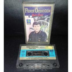 Kaset Ferdi Özbeğen yaktı geçti albümü.Orijinal. Dönem Kağıt Baskı. Kaset ve kartonette yazı var.