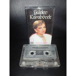 Kaset Gülden Karaböcek aşığım seviyorum albümü. Orijinal dönem kağıt baskı. Kasette çalışmaya engel olmayan kırık var. Sorunsuz çalışıyor.