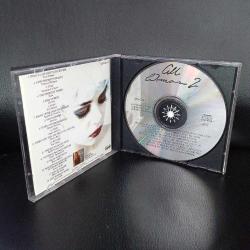 Cd All Woman 2 albümü. Orijinal 1992 baskı. Sorunsuz çalışıyor. Kate Bush, Marie brennan, stevie nicks, bette midler, dusty springfield, buffe sainte marie, Tori amos, diana ross, annie lennox, donna summer, martika, Sophie b. hawkins, sam brown, des'ree, sade, Shakespear's sister, Vanessa Williams, Tina Turner