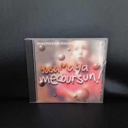 CD Bulutsuzluk özlemi, yaşamaya mecbursun - canlı ve fişsiz. Kırmızı bandrollü dönem albümü. Orijinal. Sorunsuz çalışıyor.