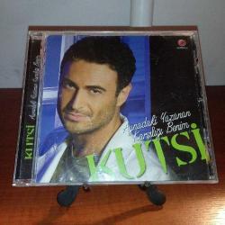 Cd Kutsi Aynadaki Yüzünün Karşılığı Benim albümü. Orijinal. Disk 10 üzerinden 9. Sorunsuz çalışıyor. Koleksiyonluk.