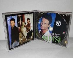 Cd Kutsi Aynadaki Yüzünün Karşılığı Benim albümü. Orijinal. Disk 10 üzerinden 9. Sorunsuz çalışıyor. Koleksiyonluk.