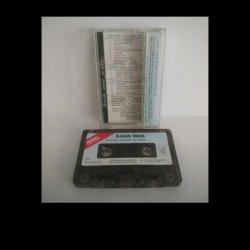 Kaset ilhan irem, pencere köprü ve ötesi albümü. Kartonette yapışma var.