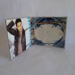 CD Gökhan Özen Duman Gözlüm Albümü. 2001 Universal. Orijinal. Sorunsuz çalışıyor.