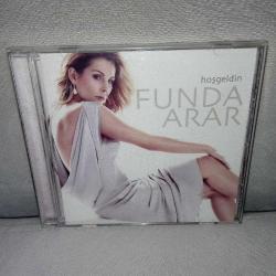 Cd Funda Arar Hoşgeldin Albümü. Orijinal. Dinlemeyi etkilemeyen çizikler var. Sorunsuz çalışıyor..