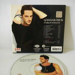 CD Gökhan Özen Resimler Hayaller albümü. Dinlemeyi etkilemeyen çizikler var. Orijinal. Sorunsuz çalışıyor.