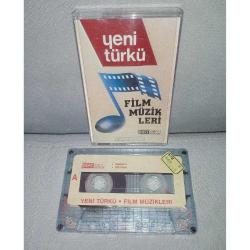 Kaset Yeni Türkü Film müzikleri. Orijinal. Dost Kitabevi yayınları. dönem kağıt baskı. Sorunsuz tertemiz koleksiyonluk. BADİ, GÖÇMEN YILDIZI, DERT ORTAĞI, DERMAN, DELİKAN.
