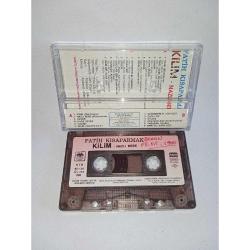 Kaset Fatih Kısaparmak kilim - Nazlı bebe albümü. 1989 Kağıt Baskı. Kasette yazı var.
