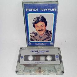 Kaset Ferdi Tayfur kurtuldum albümü. Dönem Kağıt Baskı. Kaset, kartonet, kayıt orijinal ve tertemizdir.