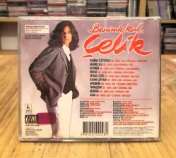 ÇELİK BENİMLE KAL CD DÖNEM BASKI KIRMIZI BANDROL