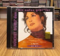 NÜKHET DURU BİR NEFES GİBİLER 30 HİT CD DÖNEM BASKI SARI BANDROL
