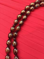 Kuka tespih  imame alpaga mercan ,firuze ve  bronz kakma usta işi tespih uzunluğu imame hariç 30 cm  habbe büyüklüğü 12 mm usta işi