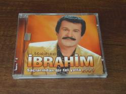 MALATYALI İBRAHİM - SAÇLARINDAN BİR TEL YOLLA - 2004  .. DÖNEM BASKISI MÜZİK CD SİDİR.