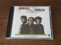 HIRSIZ POLİS AŞKIN KANUNU OLMAZ DİZİ MÜZİKLERİ .. DÖNEM BASKISI MÜZİK CD SİDİR.