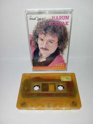 Kaset Harun Kolçak beni affet albümü.  Orijinal. Kartonette yazı var. sorunsuz çalışıyor.