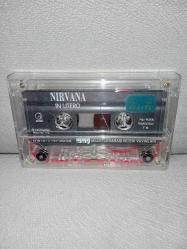 Kaset Nirvana in utero albümü. Orijinal. Kartoneti yok. Kasette çalışmasını etkilemeyen minik kırık ile çatlak var. Baştan sona sorunsuz çalışıyor.