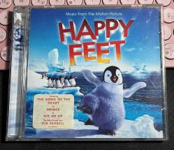 HAPPY FEET - MUSIC FROM THE MOTION PICTURE - FEATURING THE SONG OF THE HEART BY PRINCE & HIT ME UP THE DEBUT SINGLE FROM GIA FARRELL - WARNER BROS ENTERTAINMENT 2006