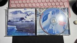 HAPPY FEET - MUSIC FROM THE MOTION PICTURE - FEATURING THE SONG OF THE HEART BY PRINCE & HIT ME UP THE DEBUT SINGLE FROM GIA FARRELL - WARNER BROS ENTERTAINMENT 2006