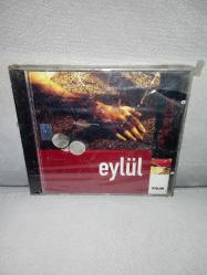 Cd Grup Yorum Eylül. Ambalajında sıfır. Orijinal 2000 KALAN Müzik. koleksiyonluk. Jelatininde soyulmalar var.