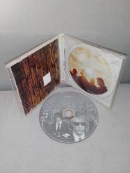 Cd Bonjovi Bon Jovi Crush albümü. Orijinal 2000 Avrupa baskı. Dinlemeyi etkilemeyen çizikler var. sorunsuz çalışıyor koleksiyonluk