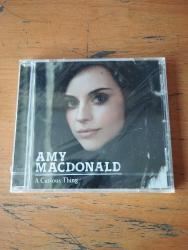 AMY MACDONALD * A CURIOUS THING * CD ALBÜM * 2010 MELODRAMATIC