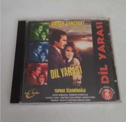 VCD DİL YARASI. ORHAN GENCEBAY - YAPRAK ÖZDEMİROĞLU. ORİJİNAL. 2 DİSK. İYİ DURUMDA. SORUNSUZ ÇALIŞIYOR. KOLEKSİYONLUK