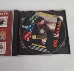 VCD DİL YARASI. ORHAN GENCEBAY - YAPRAK ÖZDEMİROĞLU. ORİJİNAL. 2 DİSK. İYİ DURUMDA. SORUNSUZ ÇALIŞIYOR. KOLEKSİYONLUK