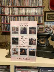 00:00 Biri Sizi Düşünüyor / 01:01 Bugün Adımı Sen Koy  2 kitap