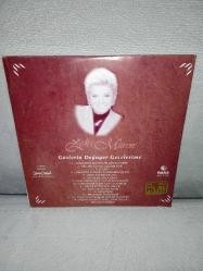 Cd Zeki Müren gözlerin doğuyor gecelerime. Orijinal Raks 1997 sarı bandrollü dönem baskı albüm. Disk 10 üzerinden 9.5 sorunsuz çalışıyor koleksiyonluk