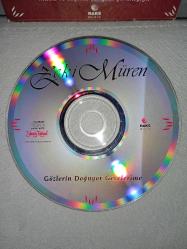 Cd Zeki Müren gözlerin doğuyor gecelerime. Orijinal Raks 1997 sarı bandrollü dönem baskı albüm. Disk 10 üzerinden 9.5 sorunsuz çalışıyor koleksiyonluk