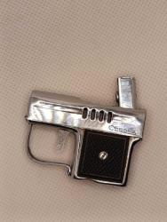 Tabanca şeklinde eski çakmak 