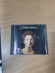 ZUHAL OLCAY KÜÇÜK BİR ÖYKÜ BU CD İKİNCİ EL DÖNEM RENKLİ BANDROLLU ÇOK TEMİZ