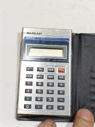 K79----PİLİ BİTİK SHARP EL-838 HESAP MAKİNASI