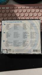 GREATEST SONGS OF THE 70'S - TOPLAM 3 ADET MÜZİK CD'Sİ FOTOĞRAFLARDA İÇİNDEKİ ŞARKILAR MEVCUT FOTOĞRAFLARA İYİ BAKALIM... - ÜZERİNDE KİRİL ALFABESİYLE YAZIYOR DOLAYISIYLA TERS KAPAK... - CD LER TEMİZ...