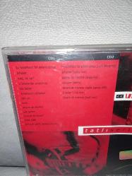 Cd Vega tatlı sert 2 albümü. Orijinal. 2003 Universal baskı. 2 Disk. Dinlemeyi etkilemeyen çizikler var. Sorunsuz çalışıyor. Nadir albümlerden. koleksiyonluk