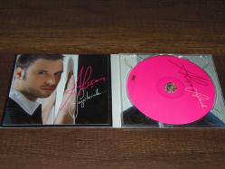 ALİŞAN - SEVGİLERİMLE   DÖNEM BASKISI SIFIR AYARINDA ÇOK TEMİZ MÜZİK CD SİDİR.