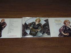 PINAR ALTINOK - DORUKTAKİ ŞARKILAR   DÖNEM BASKISI SIFIR AYARINDA ÇOK TEMİZ MÜZİK CD SİDİR.