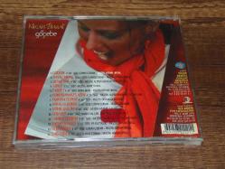 NİRAN ÜNSAL - GÖÇEBE   ...  DÖNEM BASKISI SIFIR AYARINDA ÇOK TEMİZ MÜZİK CD SİDİR.