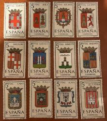 1962.EYALET ARMALARI..İSPANYA 12 PUL  ŞARNİYELLİ .ALT SAĞDAKİN BÜKÜLMÜŞ.DAMGASIZ