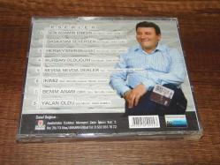 SEFER AZİMLİ - SEN ADAMIN DİBİSİN  ...  DÖNEM BASKISI SIFIR AYARINDA ÇOK TEMİZ  MÜZİK CDSİDİR.