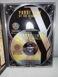 Cd+ Dvd Yanni  LIVE At The Acropolis  YANNI - LİVE At The Acropolis. Orijinal. Amerikan baskı NTSC. Digipack 10 üzerinden 9. Diskler 10/9.5 iyi durumda sorunsuz çalışıyor. koleksiyonluk