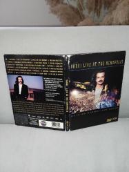 Cd+ Dvd Yanni  LIVE At The Acropolis  YANNI - LİVE At The Acropolis. Orijinal. Amerikan baskı NTSC. Digipack 10 üzerinden 9. Diskler 10/9.5 iyi durumda sorunsuz çalışıyor. koleksiyonluk