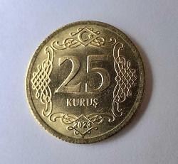 397// 25 kuruş Altın renkte (2023)