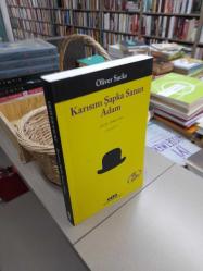 Karısını Şapka Sanan Adam