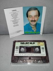 Kaset Nejat Alp yandı gönlüm albümü. Orijinal 1989 Kağıt Baskı. sorunsuz çalışıyor. tertemiz koleksiyonluk
