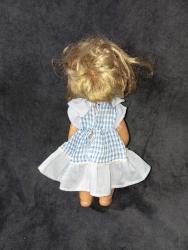 25 cm boyunda oyuncak bebek Marka damga yok