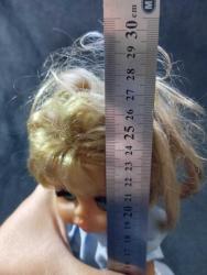 25 cm boyunda oyuncak bebek Marka damga yok