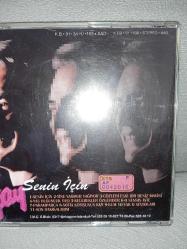 Cd Alpay senin için albümü. Orijinal 1991 pembe bandrollü dönem baskı albüm. Disk 10 üzerinden 9,5 çok iyi durumda sorunsuz çalışıyor koleksiyonluk